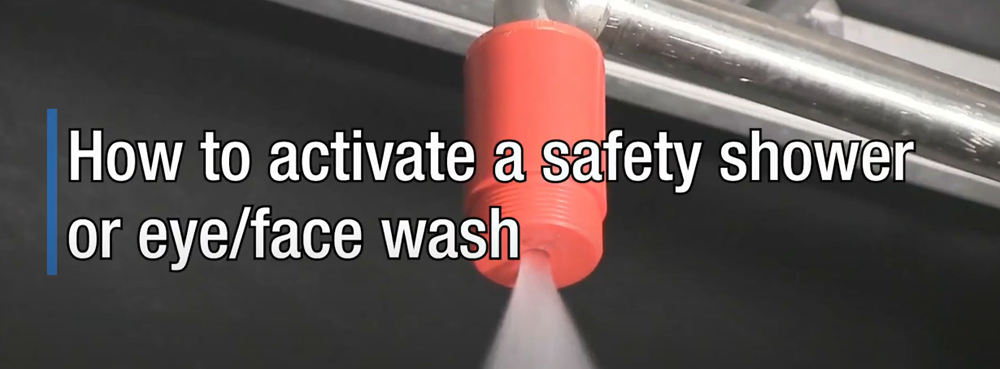 Activated Hughes safety shower nozzle with text relating to article on banner