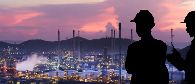 Workers overlooking a work site