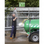 Hughes mobile safety shower bowser in use by worker